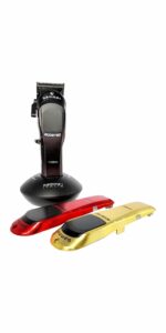 Gamma Boosted Cordless Clipper in Black on stand with red and white covers below