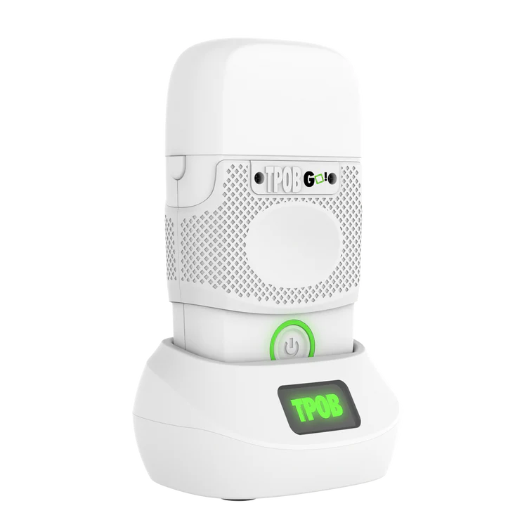 TPOB Go Shaver Whiteout Edition - on charging stand angled right