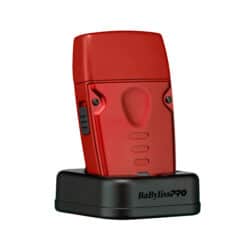 BabylissPro Compact Lo-ProFX Single Foil Shaver Red #FXLPFS1RD - On charging stand